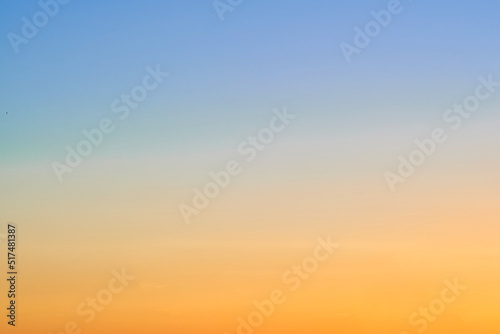 Sunset red and blue gradient sky, copy space for text. Orange-blue sky gradient, clear sky without clouds
