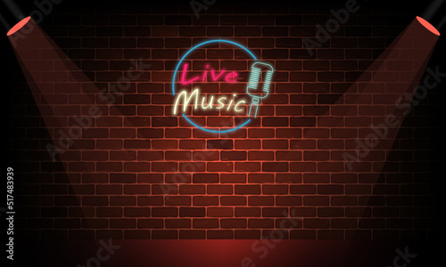 A live music neon sign on a brick wall background illuminated by red spotlights like a concert stage.