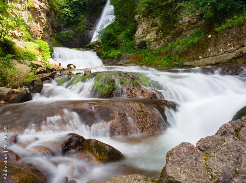 Fototapeta premium Fassa Valley, Italy, waterfall in the forest