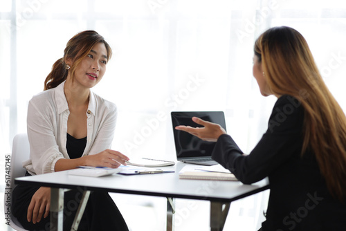 Female manager in office discussing and interviewing job applicant for new employees. Businesswomen and colleagues discussing and discussing work on business projects together.