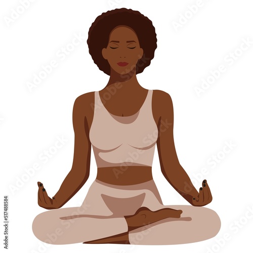 Black woman sitting in yoga lotus pose