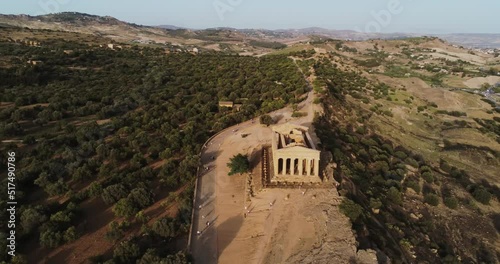 Aerial shot of the Greek Temple of Concordia at sunset in Sicily, Italy. valley of the temples in Agrigento.