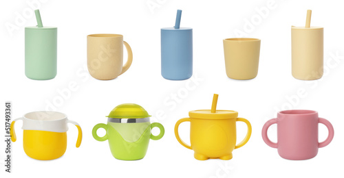 фотографія Set with colorful baby cups on white background. Banner design