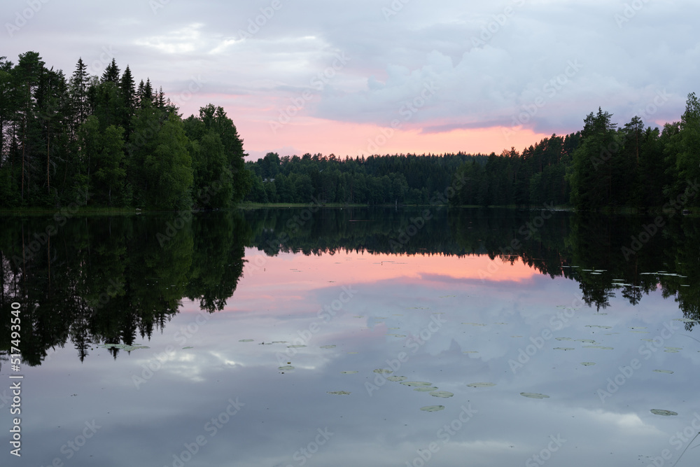 Summer sunset by the lake in eastern Finland 