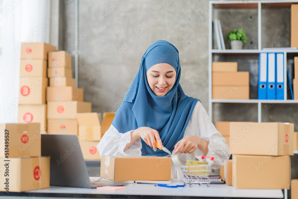 Beauty muslim woman in hijab working in the office Beauty muslim woman in hijab working in the office