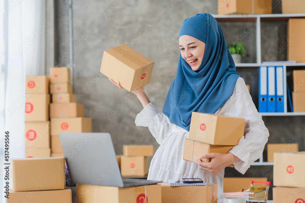 Beauty muslim woman in hijab working in the office Beauty muslim woman in hijab working in the office