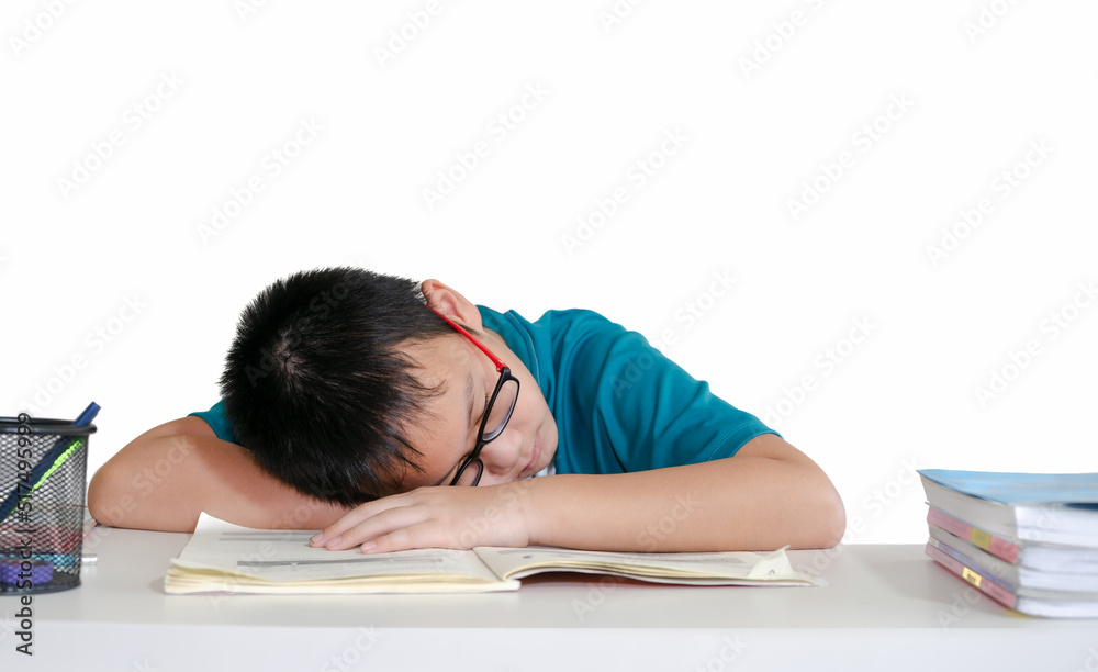 Little boy student sleeps during lessons in his classroom Little boy student sleeps during lessons in his classroom