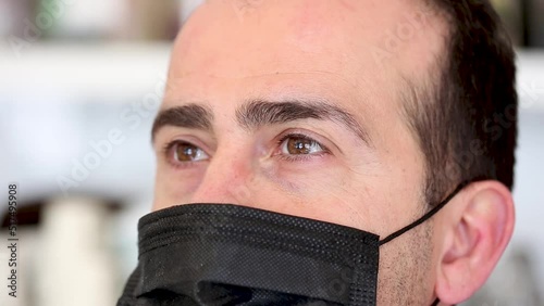 Close up portrait of charming mature man in medical face mask