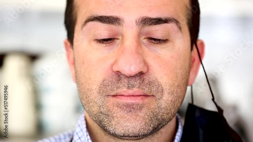 Close up portrait of charming mature man in medical face mask