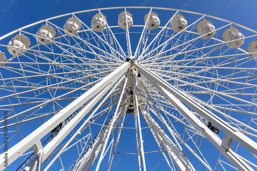 big wheel against blue sky big wheel against blue sky