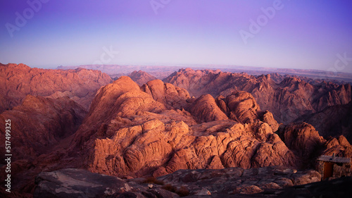 Przed wschodem słońca na górze Horeb. Egipt 2020. Widok z góry Synaj.  Poszarpany nagi masyw górski z szaroczerwonego granitu photo