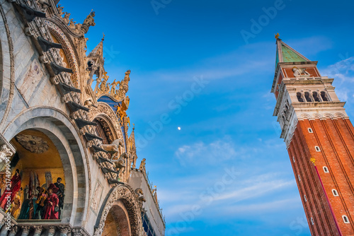 Beautiful roof ornaments of Basilica San Marco and the Campanile di San Marco at St. Mark's Square in Venice, Italy 