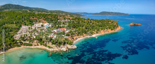 Aerial view over Chrisi Milia beach and the rocky surrounded area in Alonissos island, Greece © panosk18