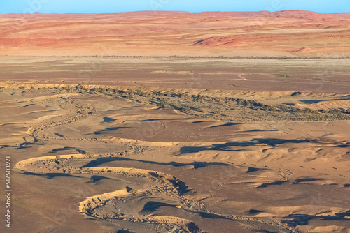 Namibia, aerial view of the Namib desert, wild landscape, panorama in rain season
