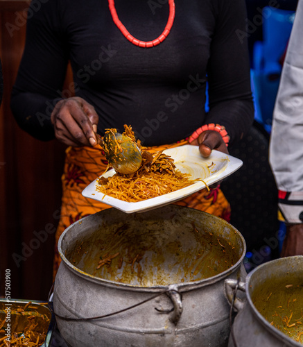 A plate of Abacha (African Salad) being served to a guest.