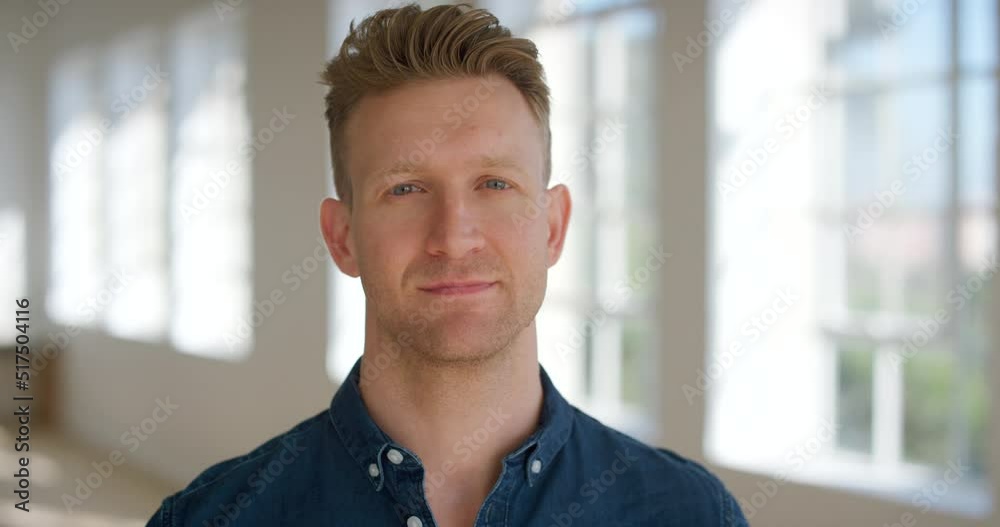 Portrait of a business man showing a serious facial expression while standing alone in an office. Closeup headshot and face of an assertive, confident and proud entrepreneur, manager or a startup ceo Portrait of a business man showing a serious facial expression while standing alone in an office. Closeup headshot and face of an assertive, confident and proud entrepreneur, manager or a startup ceo