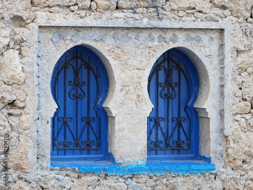 Windows near Ras El Maa waterfall in Chefchaouen town, Morocco photo