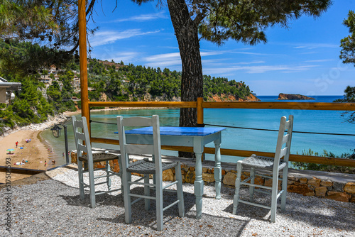 Beautiful restaurant view towards Chrisi Milia beach in Alonissos island, Greece