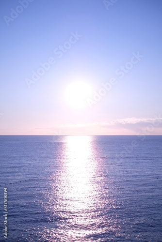 sunrise over the sea © 百合 須藤