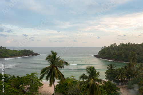 Aerial view of bay with surfers. Hiriketiya, Sri Lanka.