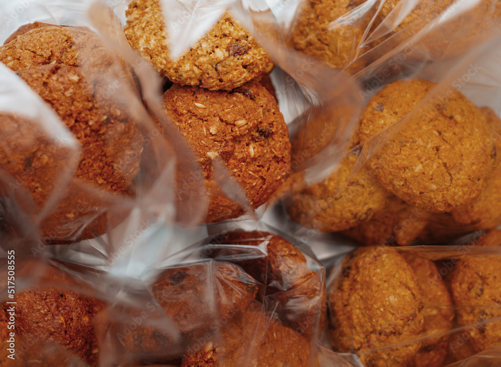 Fototapeta premium oatmeal cookies in portions in plastic packaging