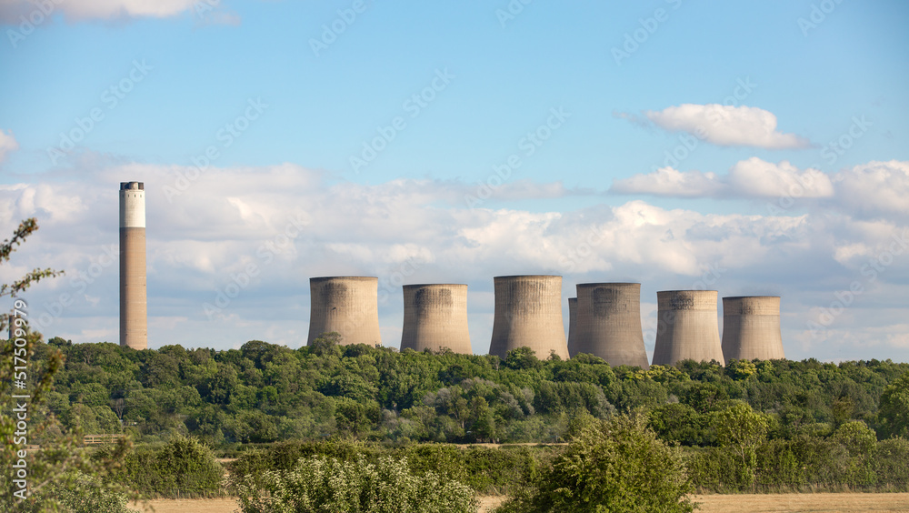 Landscape of Power Station chimney surrounded by trees and countryside