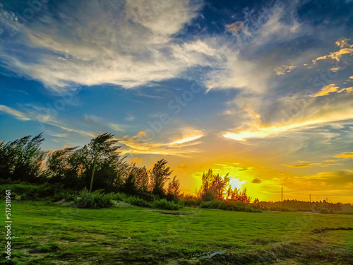 sunset in the field © Apc Arif