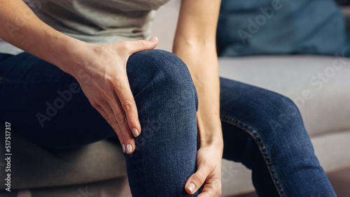 Human is in Severe Pain Due To Joint and Knee Problems. Close Up of a Person Experiencing Discomfort in a Result of Leg Trauma or Arthritis. Massaging the Muscles to Ease the Injury.