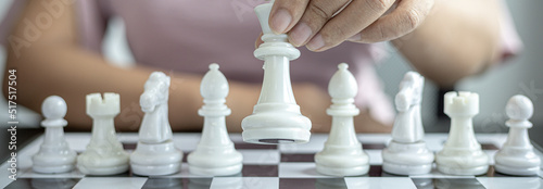 Obraz na plátně Businesswoman playing chess, Proactive business planning and marketing strategy just like playing chess, Business competition and success, Leadership concept