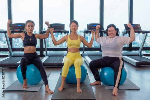 Young Asian woman Flexible slim doing splits workout, practice yoga or pilates. Woman natural beauty and wellness
