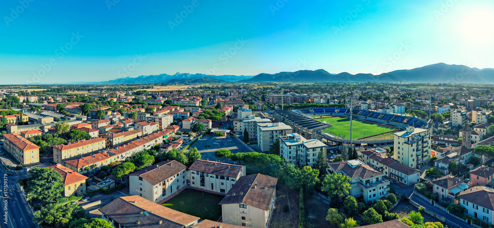 Pisa, Italy - Arena Garibaldi Stadium and city homes. Amazing panoramic aerial view at dawn