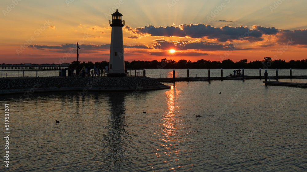 Sensational Sunset with a Lighthouse at a Marina