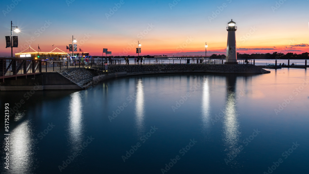 Sensational Sunset with a Lighthouse at a Marina