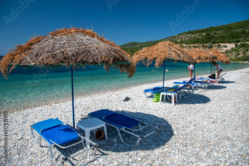 Fototapeta Naklejka Na Ścianę i Meble -  Mother and daughter enjoy the beach of Agios Dimitrios on a beautiful summer day, Alonissos, Greece