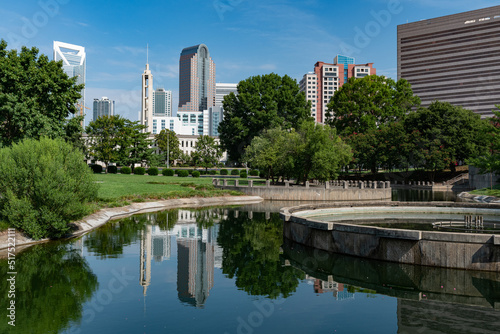 The Charlotte  NC skyline viewed from Marshall Park on a blue sky day in the summer