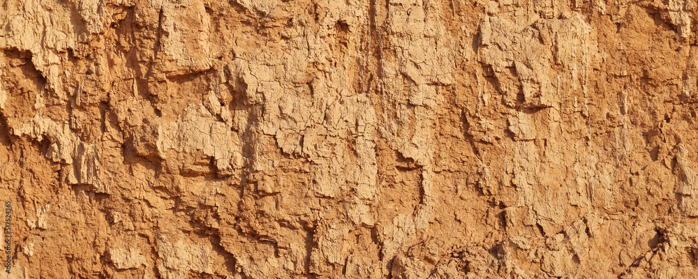 background of red brown earth rock and clay in section
background of red brown earth rock and clay in section