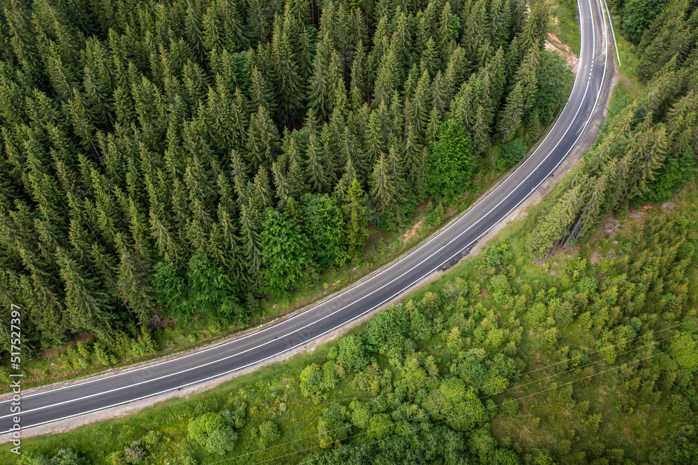 Road curve in mountains aerial view