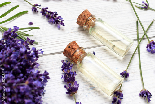 Lavender essential oil among flowering lavender flowers. effective in case of hair loss, stimulates hair growth, gives shine, relieves dandruff, strengthens nails, is used as a repellent.