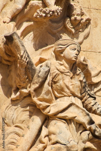 Nice baroque facade with sculpture of the Iglesia de Santa Eulalia in Murcia on a sunny day 