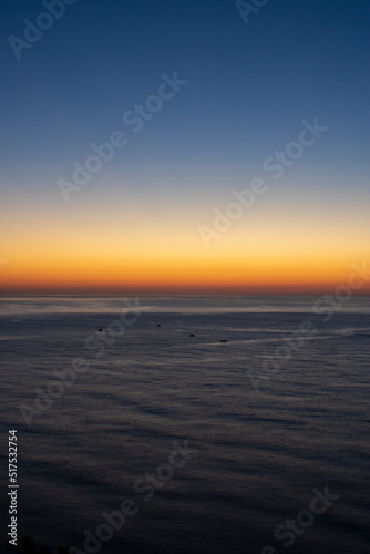 Line of the horizon on the sea at dusk