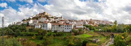 Panoramic view of the town of Aroche with its white houses in Andalusia, Huelva, Spain