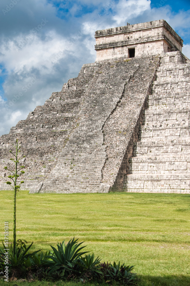 Main big pyramid of Chichen Itza archeological Mayan site on the Yucatan peninsula, Mexico. Peaceful and quiet picture shot in the morning without people. 