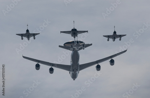 Fototapeta Naklejka Na Ścianę i Meble -  Paris, France - 07 17 2022: Air show of July 14. military planes flying above the district of La Defense