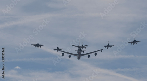 Paris, France - 07 17 2022: Air show of July 14. military planes flying above the district of La Defense