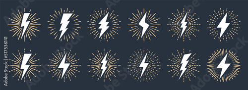 Set of vintage lightning bolts and sun rays isolated on white background. Lightnings with sunburst effect. Thunderbolt, electric shock sign. Vector illustration.