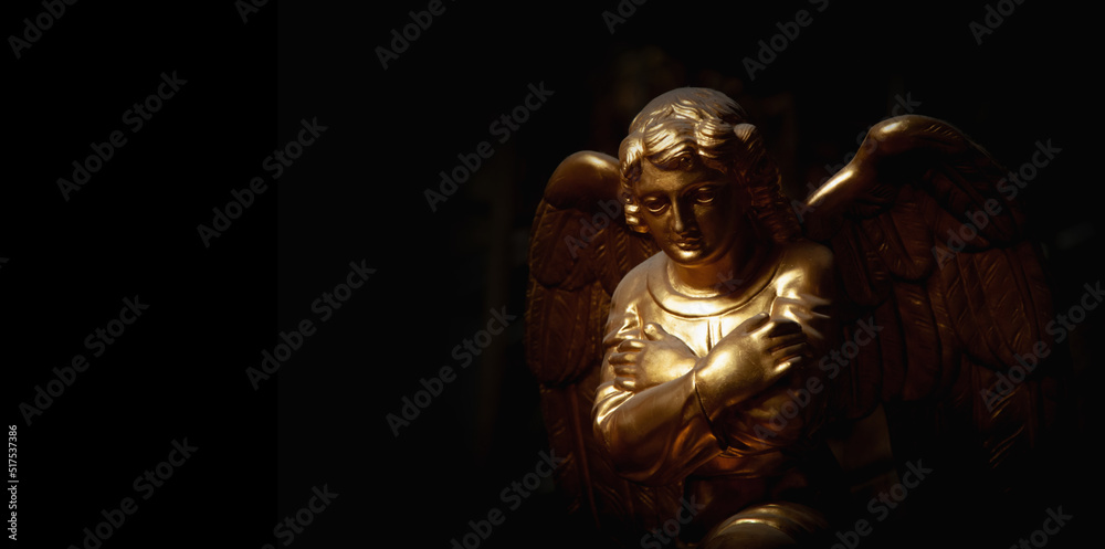 Praying angel with arms across chest. Copy space. Praying angel with arms across chest. Copy space.
