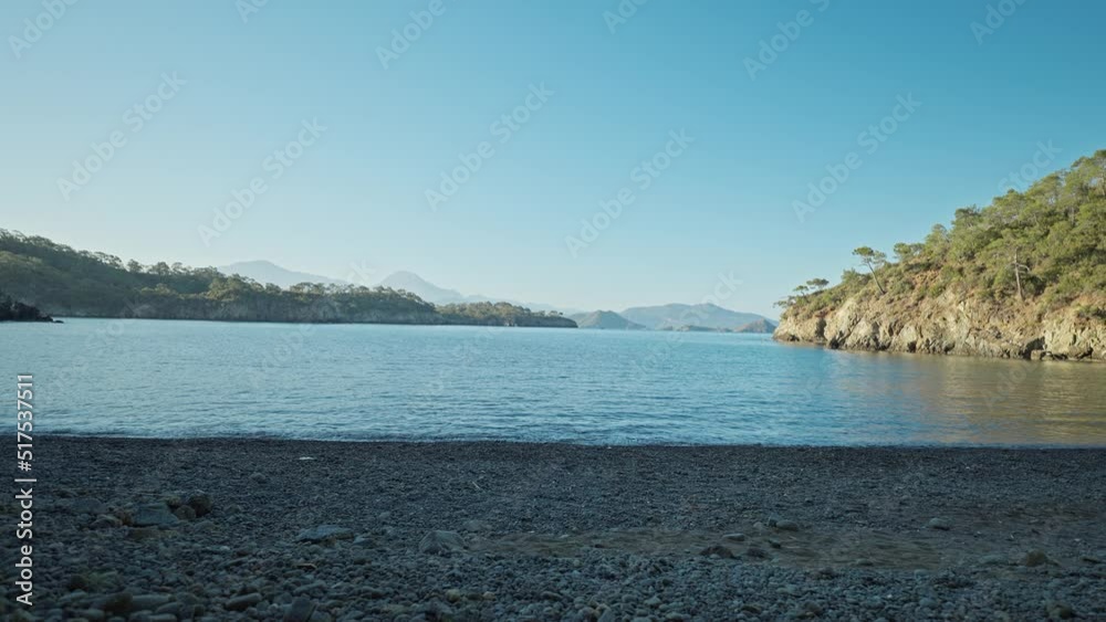 Two people travelers lying in tent in sleeping bags with view at wild tropical beach, wanderlust and adventure concept Two people travelers lying in tent in sleeping bags with view at wild tropical beach, wanderlust and adventure concept