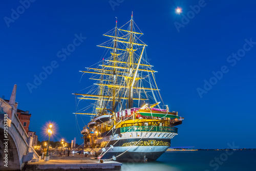 The famous Tall Ship Amerigo Vespucci in Venice, Italy at night  photo