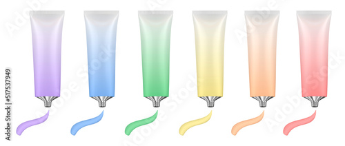 Rainbow palette of acrylic paint in metal tubes. Liquid watercolor. Oil paint or gouache. Paint smears. Tempera splash. Purple, blue, green, yellow, orange and red colors.