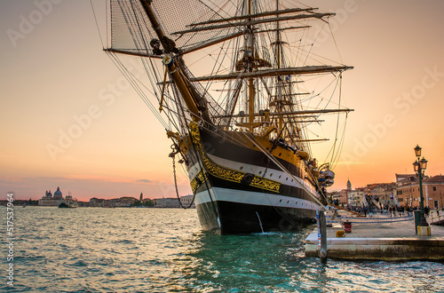 фотографія The famous tall ship Amerigo Vespucci in Venice, Italy during sunset